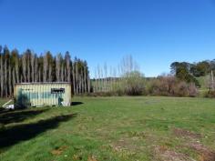  2022 Nugent Rd Nugent TAS 7172 $60,000 Nothing Nicer Than Nugent Nugent is 20 kilometres from the township of Sorell. This block of approximately 3298m2 is located right in the heart of the close-knit community opposite the local hall and alongside the quaint little church building. The triangular shaped land is reasonably level and has been well cleared making it ideal to build upon subject to approval from the local council. There is a converted container that provides shelter and temporary accommodation. It has a timber flooring, a modern kitchen and room remaining for either a lounge or bed. Sliding glass doors at the front open to a sunny deck.  So if you want to live in the country and enjoy the peace and quiet on offer at a very affordable price, check out this land and see what you think. General Features Property Type: Land 