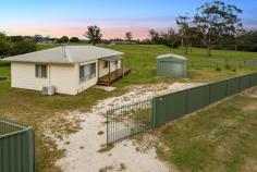  69 Winkleigh Rd Exeter TAS 7275 $189,000 - $219,000 Enjoy both worlds! Close enough to walk to the centre of Exeter where you can purchase nearly anything you could possibly want but just on the outskirts of the town to enjoy the peace and quiet offered. Surrounded by neighbouring farmland and set on a roomy 1141m2 level block the home offers a comfortable three bedroom layout with open plan living. The home features timber floor boards, roller shutters, Reverse cycle air conditioner and a large shower. The neat block is well fenced including full length front colourbond fencing. The colourbond single garage and separate garden shed are perfect for storing your vehicle and garden bits and bobs. General Features Property Type: House Bedrooms: 3 Bathrooms: 1 Land Size: 1141 m2 