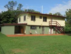  8553 Bruce Hwy, Bloomsbury QLD 4799 LIFESTYLE, PRIVACY AND MANGO FARM INCOME STREAM.4 BEDROOM FAMILY HOME WITH PRIMARY PRODUCING BENEFITS Fully renovated, this elevated and extensive four bedroom two bathroom family home will exceed your expectations. Nestled on approx. 15 acres with a potential income stream from 1000 mango trees, and a huge 10m X 30m crane shed with concrete floor and 3 phase power, it delivers fantastic versatility. In the home, the ground level presents open plan living spaces including a kitchen/meals area with customised white cabinetry, stainless steel appliances, dishwasher and pantry. The adjoining family room will become the hub of the home while the all weather alfresco area is all about entertaining. This level also benefits with a separate toilet. Upstairs has all four double bedrooms, including a large master with roomy WIR/sitting room and impressive en-suite with corner spa bath, while the other bedrooms are serviced by a pristine main bathroom and separate toilet. Extras include polished timber floors, numerous air conditioners, security screens, overhead fans, 3 X 6000 gallon rain water tanks reticulated to the house, in-ground sprinkler system, water bore with 6000g tank, highway shop front and extensive off street parking. Road side stall with ample parking for sale of produce accompanied with 30ft cold room and kitchen facilities. At peak season mango stall is in high demand with plentiful customer opportunity. Income is limited only by your efforts and imagination. Ideally located a stroll to the local primary school and Bloomsbury Rural and service station, 45 minutes to Airlie Beach shopping, restaurants and marinas, only an hour from both Mackay to the south and Bowen to the north with the convenience of Proserpine which caters for State & Catholic High Schools. All your normal sporting activities are well catered for which include golf course, bowling greens, council swimming pool, hospital and all sporting arenas. The Proserpine community Entertainment Centre caters for latest release movies,music concerts and functions. All of this only 25 minutes to the north. Did we mention fishing and crabbing? only 10 minutes away. 