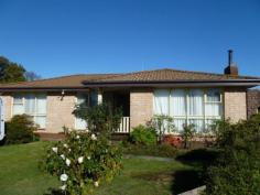  3 Camelia Pl, Devonport TAS 7310 $229,000 Always beautifully presented this charming 3 bedroom home enjoys a quiet existence at the end of a cul-de-sac, with rear view of Kelsey Tier. The generous carpeted lounge has a wood heater and two large windows gathering warmth from the sun from early morning till late in the day to beat winter chills. The adjacent dining room looks out on a portion of the beautifully established gardens. The kitchen has an abundance of natural timber cabinets and splash back providing a charming warmth to the room. The white cooktop and wall oven & grill combo as well as the more than ample spotless white bench tops contrast beautifully with the timber cabinets. An adjacent timber lined breakfast nook is ideal for the children (or grandchildren) to have a snack, play cards or a computer game. All three bedrooms are a good size and all have built in robes. Two are certainly large enough to be called doubles. An electric heater in the hallway takes the chill out of the air in the bedrooms if required. The bedrooms are centred around a gorgeous timber lined family bathroom with a sunken bath and shower feature. Plenty of off street parking is available on the long driveway and in the spacious attached garage. The ample 787m2 allotment has a rear garden that is a delightful combination of lawns, flower beds, and a vegie patch. Something for all the family to enjoy. The location could not get much better with numerous retail outlets as well as doctors, chemist, primary and high schools all in walking distance. Yet the location is as quiet as they come. This home would suit the young family, garden loving empty nesters or an investor, with the current occupants willing to stay on. Call today to secure your opportunity to view this beauty before it is too late. 