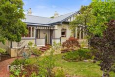  23 Bay Road New Town TAS 7008 $885,000+ Surrounded by beautiful, seasonal gardens, which are home to a variety of ornamental trees, shrubs and a plethora of spring bulbs, "Cornelia House" is indeed a rare find in one of the most sought after locations in Hobart. Built in approximately 1875, this home has been loved, meticulously maintained and undergone substantial, quality updates, maintaining many character features whilst offering a stylish home, perfect for contemporary living. 5 steps lead from the garden to the front verandah and from there, all living is on one level. The floorplan offers very easy living flowing comfortably from one room to the next. The lounge is of generous proportions and features an attractive bay window. The kitchen/dining is spacious and open plan in design. The kitchen has been recently upgraded and offers quality appliances together with an Inglenook fireplace. Light and bright, the kitchen offers all the mod cons whilst maintaining a sense of character. There is direct access from the kitchen to the attractive, paved courtyard ensuring summertime entertaining will be relaxed and enjoyable and very easy to manage.  On the opposite side of the room, there are French doors opening from the dining area to the conservatory/sunroom. Light and bright, this is a beautiful suntrap and ensures sunny winter days are still to be enjoyed with the protection of the glass and benefiting from the northerly aspect captured here. The upgraded bathroom is a recent and significant enhancement. Winning the HIA 2016 Bathroom of the Year award, this room is a contemporary masterpiece in design, use of light and stylish fixtures and fittings. 3 double bedrooms offer comfortable accommodation for a family or professionals. With the availability of a generous study, this could also be used as a 4th bedroom if required.  Outdoors, the gardens offer a private sanctuary. No matter the season, you'll find colour and interest in foliage or flowers. Fenced and secure, this is perfect for children and pets to play. There is also off street car parking for 1 vehicle. Another significant enhancement to the home is a new roof, together with 14 solar panels. This is a stunning property offering perfect presentation in a highly desirable location, close to schools, shopping, restaurants, cafes and the bike track and sporting facilities. We would be pleased to show you through so please call Michael or Jill to arrange a suitable time. 