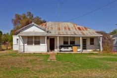  24 Belah St, Rand NSW 2642 $90,000 Set on a 1214m2 block in Rand, this fibro weatherboard home offers value for money. Comprising 2 bedrooms with built-in robes plus large sleepout, main bathroom with toilet and shower. The kitchen with electric cooking and servery flows onto the meals area and through to the lounge with wood combustion heater. With external laundry, ceiling fans, floor boards under the carpet, 2 small multi-purpose rooms and 2 rear sunrooms, this property also offers buyers the opportunity to renovate to their individual needs and style. Disclaimer: All care has been taken in compiling these particulars, but the vendor and their agents do not guarantee the details and cannot accept responsibility for errors or misdescriptions if any. Intending purchasers should satisfy themselves as to the correctness of details. 