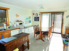  20 Cherrywood Dr Scamander TAS 7215 $365,000 (1817m2) This home sits within walking distance of the beaches, river, shops, hotel, post office, fishing, surfing and most of Scamander’s facilities. Upstairs offers 3 good sized bedrooms all with built-ins and the main with an ensuite, walk-in-robe, ocean views and deck access. The living  and dining area flow into each other and offers great space and deck access from both the dining and living areas. The main bathroom is spacious and has a spa bath, separate shower and timber vanity. Stairs lead to a very large rumpus/ games room or 4th bedroom. This area has its own  toilet and vanity, there are also 2 other utility rooms that run off the rumpus room. This area would be perfect for a teenager retreat or guest area. With some work it could be self-contained as it has its own access. There is also a double garage with carport at the rear of the property. All this sits on a large 1817m2 block with great established fruit trees and plenty of space for your boat or caravan. Good value here! 