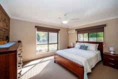  5 Cockatoo Cres Gooburrum QLD 4670 $389,000 LARGE FAMILY HOME IN TANTITHA ESTATE! SHEDS & POOL ON 1 ACRE…ALL UNDER $400,000!! Positioned on one acre in popular Tantitha Estate, is this large double brick home surrounded by a beautiful landscape of native trees and wildlife, just 7 minutes to Bundaberg’s CBD. An extremely sought after location, and a very rare opportunity to secure yourself a home with so many features, well under $400,000!! Offering a spacious floor plan, this home is perfect for the growing family. Provides two separate living areas, one as a formal lounge, the other an ideal entertainment room, complete with a built-in bar & a/c. The recently fitted designer kitchen brings light-filled tones to this space, and hosts an arrangement of cupboards & drawers. Down the eastern side of the home, you will locate all four bedrooms – the master suite has a walk-through robe, which enters into the two-way bathroom, a convenient setup for the entire family. You will also find a 2nd toilet near the laundry at the rear of the home, easily accessible from the second living area. The remaining bedrooms all have built-in cupboards & a/c and are complimented on their size. Dining out in Queensland has never been easier, especially when you have such an amazing outdoor space to utilise. Overlooking the self-cleaning salt water swimming pool, you can watch the children play whilst enjoying a barbecue breakfast. The pool area is screened for privacy via a large groomed hedge, and is complete with landscaped gardens and tiled surrounds. There is an abundance of yard space to add your very own touches, it really is a blank canvas for you to have your own fun! The welcoming entrance to the residence is a quality bitumen driveway, which leads you into the large 3 bay powered shed & convenient carport space. With median sale prices for the estate generally well over $400,000, we would suggest this is a diamond in the rough – now you have found it, the exploration is over & time for you to inspect!! Features Air Conditioning Built In Robes Dishwasher Outdoor Entertaining Pool - Inground Remote Garage Secure Parking Shed 