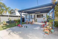  19 Campbell St Scarborough QLD 4020  $449,850 Chamferboard Charmer! This thoroughly charming post-war home will absolutely delight…character-filled with a blend of old-world ambience and new-world comforts, this will please those who appreciate a home with great heart and soul. All on one level for ease of maintenance and functionality; the home is complete with three bedrooms, stylish modern kitchen and bathroom, light-filled north facing sunroom at front, separate living and dining, separate tiled laundry, huge covered timber deck at rear, double carport, and separate powered shed/workshop in backyard, on an easy care 405m2 block with a child/pet friendly fenced backyard. Features that enhance warmth and appeal include: stunning hardwood timber floors and ornate plaster cornices; there is also air-conditioning and ceiling fans, and with a contemporary kitchen with dishwasher, and bathroom there are no big-ticket items to spend money on. The alfresco deck is a superb place for those weekend social gatherings…fire up the BBQ, chill the drinks, select your tunes, and invite around family and friends for laughter, good food and great company – many memories have been made on this back deck, and there are many more waiting to be made in coming years. Located within walking distance of the local primary school, parks, bus stops, cafes, and the Scarborough foreshore; this is a wonderful location for sea-changing downsizers or entry level buyers who are looking to embrace a relaxed Bayside lifestyle. Only 2.4 kilometres to Redcliffe and 30 kilometres to Brisbane – access to major urban amenities is relatively effortless, particularly via public transport. This truly is a cutie with lashings of appeal; if you are an aficionado of homes of this vintage, you will find this one…simply irresistible. Contact us to arrange your very own private inspection today. Open 7 days Phone 07 3203 6001 (24 Hours) OUR FAVOURITE FEATURES : • 	 Post-war charm & character with modern comforts • 	 3 bedrooms, 1-bathroom • 	 Stylish contemporary kitchen with dishwasher • 	 Separate dining, separate living, light-filled sunroom • 	 Huge rear deck for alfresco entertaining & relaxing • 	 Stunning hardwood timber floors, ornate cornices • 	 Air-conditioning, ceiling fans, double carport • 	 Lock-up powered shed at rear, perfect man-cave • 	 Child/pet friendly 405m2 easy care block • 	 Walk to beach, shops, cafes, bus, local schools • 	 Suit entry level buyers, downsizers & sea-changers! 