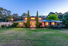  1530 Walker Street Mundaring WA 6073 $849,000 Do you want it all? A rural life? A family home? Room for horses? Irrigated paddocks? The convenience of town only minutes away? Realise the seemingly impossible with this 4.7-acre property with the lot; a family-ready 4 bedroom, 2 bathroom 2 storey home, a beautiful pool alfresco, an Olympic sized arena, regularly fertilized and irrigated paddocks, sheds, scheme water and a good bore, all set privately yet on the doorstep of Mundaring town centre. 4 bedrooms 2 bathroom Spacious 2 storey home 3 separate living areas Decked covered alfresco Below ground salt pool Workshop, shed, stables Bore irrigated paddocks Olympic-size sand arena Level 5-acres zoned RR1 Country feel, central locn An avenue of tall, well-maintained Cyprus draws your eye across green lawns to the deep verandah surrounded by lushly planted garden beds. Stepping through the gabled portico into the formal entry hall it is immediately obvious that this is a home for busy, active family life; a property that delivers amenity, comfort and space indoors and out. A formal lounge, the first of 3 living spaces, and a wooden staircase to the bedroom floor are accessed from the entrance hall. In the formal loungeroom, a slow combustion fire and gas bayonet coupled with warm-toned finishes and soft carpets create a cosy atmosphere and make for an ideal winter space. Large windows allow for views to the decked alfresco entertaining area and below ground pool beyond. Doors open directly to the verandah for easy access to the alfresco zone. Moving through the home, the kitchen and formal dining room look out to the rear of the property and views of the lawn terrace and across to the large, rear paddock. The kitchen is a well-designed space, with a 5-burner gas hob, 900 mm oven, a Smeg dishwasher and a walk-in pantry. A second lounge / family room is adjacent to the kitchen and offers a relaxed and central place for winding down at the end of a busy day. This room, with a soothing colour scheme and soft carpet, also opens to the front verandah. The third living space is set down from the rest of the home and is an expansive, family-friendly area. Large white floor tiles, high ceilings and a door to the carport ensure this room will become everyone’s favourite space; perfect for rowdy play away from the rest of the home, as a cool sunken retreat during summer, or a fantastic venue for parties with all your family and friends. All four bedrooms are generously sized, fitted with a reverse cycle air-conditioner and ceiling fan and are arranged on the second storey of the home. The main suite features a luxurious dressing room with a wall of mirror-fronted, full-height wardrobes. Adjoining this space is a gorgeous, fully tiled, modern ensuite with a shower, vanity, WC and a contemporary free-standing tub creating a wonderfully elegant room. The 3 double-size junior bedrooms are fitted with built-in robes and finished in a neutral colour scheme – offering ideal accommodation for both small children and teens. The fully tiled family bathroom includes a shower, WC and vanity. A third WC adjoins the laundry room on the ground floor. Life at this property is as much about outdoors as in. Arranged at one end of the home, the enclosed pool and alfresco entertaining area is a private oasis; a great spot for summer entertaining, laidback relaxing or hours of fun in the water. Clearly designed for horse-lovers, this property has all the infrastructure for equine activities in place. The largest of 5 paddocks runs across the rear of the property and contains a simple stable with three stalls. All of the front paddocks have been hand-planted with kikuyu and regularly fertilized. The high-quality bore water feeds a 10-station automatic reticulation system that includes irrigation of 4 paddocks. A machinery shelter and a powered, concrete slab shed provide great options for storage and work. Stop wondering if it is possible to have it all, a rural life that doesn’t compromise on convenience is available at this wonderful 5-acre property mere minutes from Mundaring and shops, cafes, library, parks, schools and transport links. Mundaring Christian College is at the front gate and the Heritage Bridle trail is 2 minutes away, waiting for you to saddle up and set off on a new adventure. 