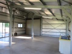  12 Bundesen Ave Midge Point QLD 4799 $230,000 The American Barn: * 10 x 10 mts, thermal sarking to some walls and entire ceiling. * Power & town water connected and also a small water tank. * Inside the barn is a double sink and an outside lean to shower cubicle. No toilet or septic. * A single carport and a smaller one to house the tractor slasher which comes with the property. * Set on a level 2.5 acre allotment with established mango trees. * Inside can be designed to accommodate a bathroom etc to make an ideal weekender.  The Area: Just a few minutes drive to Midge Point Beach, with tremendous fishing and crabbing.  The local tavern/bistro, post office and takeaway/general store is just a short walk away. A school bus services the area which travels to Proserpine and Bloomsbury Schools for all ages. Get back to nature but close enough to a cosmopolitan lifestyle. 15 minutes to Whitsunday Coast Airport, 1 hour to Mackay & Bowen and an easy drive for the mining sector. Airlie Beach 40 minutes and access to all Whitsunday Islands. 