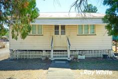  52 Kroombit Street Biloela, QLD 4715 $114,000 With a location of sheer convenience, this little gem does need some work.but the potential, like the location, is fabulous! 2 bedrooms, separate air-conditioned lounge, kitchen and a large sleep-out (third bedroom) just for starters. Large, level, fully fenced allotment on the fringe of the CBD has a shed, rainwater tank and an array of fruit trees in the back yard. Time to put your renovator's hat on and get to it! This one is potential plus! FEATURES: • Air Conditioning • Close To Shops 