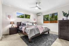  1 KOORINGAL STREET TINGALPA QLD 4173 $625,000 Wonderfully located in the high demand suburb of Tingalpa and within close proximity to Moreton Bay, schools both public and private, Wynnum Plaza and Aldi, Cafes, restaurants and parks for the kids. This stylish, lowset brick and tile home is only 9 years old. Boasting four very large bedrooms all with built in robes, ceiling fans, roller blinds and Air conditioning. The master bedroom includes private walk in robe with built in cabinetry and attached ensuite. A double door hall way cupboard allow for extra storage which is often missing in new homes. The modern, open plan kitchen and dining flows out to the delightful, undercover entertaining area. The kitchen is well appointed with a unique L shape island bench, stainless steel appliances, 5 burner gas cook top and electric oven. There is ample cupboard space as well as breakfast bench for the kids. The bathroom has a separate shower and bathtub perfect for young families and all fittings are stainless steel. The outdoor dining area is perfect for the summer BBQ’s and is set amongst tranquil bushland so no rear neighbours. The yard is fully fenced for the family pet. Loaded with essentials, the home comes with quality fixtures and fitting, easy care tiles in all the living spaces, double lock up garage with extra storage space, ceiling fans and split system air conditioning, a 5000lt rainwater tank and electronic keyless entry. Be quick and make this house your new home today. 