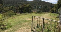  16 Groningen Road Kingston TAS 7050 $585,000 Offered for sale is this development opportunity – a solid, well-maintained house on 3114m2 (3/4 of an acre) of land that comprises two titles, and zoned General Residential thus offering the potential to build multiple dwellings. It’s located just ten minutes from the Hobart CBD with easy access to the Southern Outlet and just three minutes to Kingston shopping. The house has: - Three bedrooms, all with built in robes; - A sunny lounge room that opens to the kitchen/dining room; - A kitchen that was renovated around eight years ago; - A bathroom comprising bath, shower and vanity with a separate toilet; - Two carports; - Tas oak floorboards under the carpet; - A pleasant outlook to the surrounding hills and bush. If you are looking for a development opportunity in a very accessible location, then contact Edwards Windsor for an inspection. 