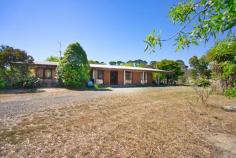  14 Spencer Road Ballan VIC 3342 $619,000  Now $599,000 The potential for this property is vast, sitting on 1 acre this double brick home offers: -3 decent sized bedrooms with BIR. -Main bedroom with ensuite, ceiling fan and WIR. -Carpeted living area with wood burner. -Functional kitchen with with ample cupboard space. -Dining area with sliding doors leading to garden. -Additional living/formal dining area - Bathroom  -Tiled flooring in kitchen. -Timber lined throughout property. -Split system heating cooling. -13m x 6m shed with power and concrete floor. -This property is not connected to town gas or sewerage. This property has all the characteristics of a rural property but is only a short walk to the main st of Ballan and all that is on offer. 