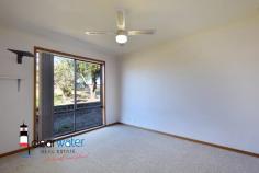  19 Hawdon St Moruya NSW 2537 $430,000 "Shayna" - A functional four bedroom, one bathroom (with space for a 2nd) brick and tile home with solar walking distance to Moruya Hospital, Moruya Bowling Club, Moruya CBD and the Moruya river. This home would be ideal for families, investors or someone who wants a single level home on an easy care block of land with mountain views. Featuring: Open plan lounge and dining, a slow combustion wood heater, air conditioning and a large covered veranda ideal for alfresco entertaining with views to the distant mountains. Currently, the single garage has been converted to a rumpus room but it could easily be changed back. There is a single carport at the side of the home. Location: Close to amenities, fishing, boating and Moruya Hospital. 