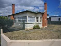  168 William Street Devonport TAS 7310 $245,000 Comprising of a solid 3 bedroom weatherboard home (approx. 124 M2) on an 888 M2 corner block. The property is fully fenced with a lockable garage, powered workshop/storage plus ample access to park the trailer, boat, caravan or RV. Spacious bedrooms, high ceilings, ample cupboard storage in the passage, solid Tas.Oak flooring throughout, sizable kitchen/dining and living area along with enclosed front and rear porches. The master bedroom with a built in robe, serviceable bathroom and laundry plus a light and airy sun room that may be used as another bedroom/office or play area for young children. The positioning of the home gathers sun rays from early morning till late afternoon, while cooler times an open fireplace is used. This property is sound and sturdy, needing some TLC, for those wishing to place their own mark to it. This property is within walking distances of the Fourways shopping, three large supermarkets and the Devonport City centre. Don College, high/primary and private Schools are also close by. This property may suit a first home purchaser, investor, builder or developer. 