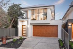  46a Ranelagh Street Glengowrie SA 5044 $875,000 - $895,000 Located just minutes to the cosmopolitan lifestyle on offer at Jetty Road Glenelg, this brand new freestanding home will offers the ultimate in low maintenance living. Finished to the highest of standards by quality builder Regent Homes, the home boasts quality fixtures and fittings throughout. The designer kitchen features Smeg appliances, stone bench tops, walk-in pantry, ample storage space and flows to the spacious open plan living and dining area. The open plan living area opens seamlessly to the all weather alfresco entertaining area that overlooks the good sized rear yard with room for the kids to play. There are 2 spacious living areas with the 2nd being on the upper level with stunning picture windows harnessing the northern winter sun. Other notable features include: – 4 good sized bedrooms – Master bedroom downstairs with the luxury ensuite & large walk-in robe – Bedrooms 2 & 3 with walk-in robes & Bed 4 with robe – Double auto garage with internal access – Zoned ducted reverse cycle air conditioning – 9 foot ceilings throughout – Full height tiling to both luxury bathrooms – Fully landscaped at front and rear – Land size 409sqm. 