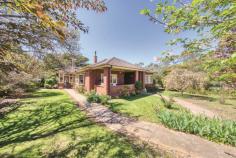  67 Monkittee St, Braidwood NSW 2622 $669,000 If it's a grand period home you've been searching for you will go a long way to find better than this solid brick beauty. Tucked away behind a cypress hedge with mature plantings across most of the 1260m2 block making privacy an absolute feature, although upon entering the front gate the beauty of this home is immediately evident. Built around 1937 by a prominent local businessman as a wedding present for his daughter the property has only ever changed hands on one occasion. There are three large bedrooms, two with open fireplaces. An expansive formal dining room also has its own fireplace, a great room where a grand piano and candelabra certainly wouldn't look out of place. The formal lounge room at the front of the home is the perfect place to greet guests for those formal dinner parties or martinis and hors d 'oeuvres on the front veranda for the more fresh approach on a balmy summers evening. A large enclosed wrap around veranda at the rear of the home provides another area for more casual living and looks out across the leafy backyard. Unlike many homes from this era most things remain original with leadlight windows, decorative cornices , picture rails and high ceilings- this truly is a grand home. NB This property is currently tenanted . Inspections will be on an appointment basis only with the exclusive agent. 