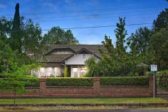  129 Webster Street Lake Wendouree VIC 3350 $2,600,000 - $2,700,000 Set amongst idyllic green gardens and mature trees on a private 1300sqm block is this enchanting period home, only metres from Lake Wendouree. One of Ballarat's most coveted locations, Webster Street is a tree-lined avenue of heritage homes and historic charm. The house was designed and built by Architect Wilfred Coltman in 1928 and retains the superb period features of the era combined with the conveniences of modern living. The original areas of the home feature wood panelling and coffered ceilings, along with solid wood doors set with leadlight glass panels. A formal entrance welcomes you, rich with the tones of dark wood and warmed by polished timber flooring. The formal living at the front of the home is full of period character, overlooking the lush gardens through the big bay window. Sliding doors lead to the huge master bedroom, with its lovely deep sills and open fireplace. The adjoining bathroom is large and beautiful, blending modern tiling and glass shower with old world features such as the clawfoot bath and fireplace. There is also a separate and spacious walk-in robe, completing the master suite. Three other bedrooms also enjoy the elegant features of the period, the largest offering coffered ceilings and a beautiful open fireplace.. Each bedroom has walk-in robes while one also has its own ensuite, which would be ideal as guest accommodation. A fifth bedroom has built-in shelves making it ideal as a possible study. A modern extension at the rear of the home houses the informal living areas. The kitchen is large and modern with new AEG appliances including induction hot plate and dual ovens, a built-in wine rack, large walk-in pantry, electrically operated overhead cupboards and drawers, marble benches and an island bench. There's even room for a double sized fridge. Reverse cycle air conditioning maintains perfect temperature control. The kitchen forms part of an open plan family area with modern dining and living spaces. A wall of windows in the family area offers garden views and glass doors lead out to the huge terrace and outdoor entertaining space with an automatic self-closing, fully adjustable louvred roof. The family living room has windows on three sides, with floor-to-ceiling height windows framing the open stone fireplace and solid cement hearth. Two sets of bi-fold windows can be opened to let the outside room become part of the living space. This is luxury and comfort combined. Throughout the older section of the home are a host of original features including high ceilings, picture rails, wooden mantlepieces, wood panelling, leadlight windows and deep windowsills. Superb light fittings add to the feeling of style and elegance. The modern wing is streamlined and beautiful, making the most of modern touches like downlights and a wine storage room. The home has hydronic heating and a ducted vacuum system throughout. Outside, a three-car garage with remote control door, and connected to water and power, mature trees and a 25,000-litre water storage tank with pressure pump complete the picture. A remote-control front gate and remote sensor lights along the driveway mean you don't have to lift a finger until you're safely parked. This is a distinguished home and a welcoming one. Properties in this area are highly sought after and this property is now offered for sale for only the third time in its life. This is a premier piece of heritage real estate in an ideal location, just a short walk from Lake Wendouree, cafes, hospitals and the finest schools. This is one of Ballarat's finest homes and it could be yours. To arrange a private inspection of this grand old home, contact Tony Douglass on 0418 555 973 today. 