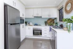  4/154 FERN STREET GERRINGONG NSW 2534 $639,000 This spacious townhouse offers the comfort and lifestyle of coastal village life. Currently rented to a great tenant at $460p.w. Centrally located in the heart of Gerringong, enjoy the short stroll to all the local amenities including cafes, shops, and restaurants or just a short drive to Werri Beach and Boat Harbour swimming pool. There are two generous sized bedrooms with built-in robes, spacious open plan living area which opens out to an alfresco terrace area and private courtyard. This stylish townhouse offers comfortable living all year round with reverse cycle air conditioning. There is a single garage plus an additional single carport. 