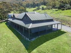  145 Kiah Road Burra NSW 2620 $1,290,000 If you have been searching for a larger than normal acreage block within easy commuting distance, your search may be over. Acreage of this size is rarely found in the Burra Valley itself. This privately located and majestically sited property offers something for everyone - an exceptional home, good grazing, great bush - perfect for walkers, plus good infrastructure. The residence with its wide verandahs, huge formal living space, gourmet kitchen with butler's pantry, is poised for elegant entertaining. High ceilings, large segregated master bedroom and option of up to five bedrooms, good informal family space, billiards/games room and a lovely character throughout create a home that is quite unique. Features: . A home of character and distinction that is light filled and instantly welcoming on a 90 Hectare block (approx.) . Wide verandahs wrap three sides of the home and enjoy the panorama . Massive combined formal living and dining room of a size rarely seen . High ceilings and floor to ceiling windows in this room capture the lovely vista . Large segregated master bedroom with walk in robe and ensuite will suit the most fastidious . Option for up to five bedrooms in total . Delightful gourmet kitchen with adjacent meals area will suit the 'chef de cuisine' with its caesarstone benchtops, massive oven and fantastic separate butler's pantry, a true entertainers delight! . A large billiards/games room links the informal family space to the kitchen meals area . Electric blinds in living and kitchen areas . The good sized family room is an ideal teenagers retreat or rumpus room and is located near the balance of the bedrooms. This room also features a wet bar and SC wood heater .Discrete powder room at front foyer . Insulated ceilings and external walls . Heating - gas ducted in master, kitchen, study and games room; ducted RC inh living and ensuite bathroom; split system in family space; slow combustion wood heater in formal lounge; slow combustion wood heater in family area . Hot water - electric off peak . ADSL plus house wired for internet and TV to all rooms . Good infrastructure with seven dams . Timber stables with concrete floor and power . Numerous small shelter sheds . Large three sided shed approx 9 x 7 with power . Double garage with concrete floor and two roller doors and power . Palerang Council Rates $2500.00 p.a. approx . 30 minutes to Canberra CBD and only 10 minutes to the new Googong township, with all it's facilities.. 