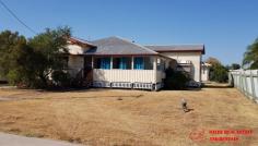  13 Patrick Street Dalby QLD 4405 $950,000 One of the grand original 3 bedroom homes in Patrick St, in need of a little TLC, has a big kitchen with lots of custom built cupboard space, dish washer, rangehood. Carpeted entry foyer and sunroom extending around one side, Large dining area, good sized bathroom with separate shower and bath, gas heating and hot water, evaporative cooling and ceiling fans, VJ walls with picture rails and high ceilings, all good sized rooms, carpets and floor coverings are good, aluminium windows and security screens, huge downstairs rear entertainment area with wood heater, rear covered car parking. 3 Modern free standing 2 bedroom air conditioned units provide a nice package for the property Owner however these are not separately titled. Current rental return is $47840 pa making this complex a great opportunity to own a piece of a select area of Dalby Location is great close to centre of town and high schools, flooding is unlikely in this sought after part of town… 