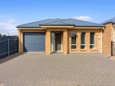  3/72 Butterworth Road Aldinga Beach SA 5173 $295,000-$315,000 This gorgeous, 2012 built, single level villa, is one of just three, sitting right opposite the marvellous Symonds Reserve. The perfect Lock it and Leave it' home, features three spacious bedrooms with two way ensuite access to the master, two toilets for family convenience, spacious open plan living and a wonderful outdoor undercover patio to entertain your guests. Sited on a marvellously low care allotment, just metres to the beach at the end of Butterworth Road and with major supermarket shopping at the other end, it's all just a short stroll to the Aldinga Wetland walking trails, doctors, chemists, library, shops and of course, all the fun of the stunning Southern suburb beaches! Featuring plenty of off street parking, the secure under the main roof garaging has the services of an auto roller door and internal access for convenience whilst the fully paved front and rear yards deliver the ideal Lock it and Leave it' property, with little or no maintenance to worry about in your absence. Stepping in to the residence and the extra wide passage accentuates the feeling of spaciousness on offer whilst the quality of the trim and fittings, compliment the modern dcor and tone on show throughout. To the right of entry, the master bedroom at the front of the home is spacious and enjoys the services of a large, His and Her' walk in robe and ensuite two way access to the three way bathroom which boasts shower and bath facilities, a separate vanity and separate toilet for family convenience. A little further down the passage, alongside the bathroom is the laundry complete with a very handy work bench and independent access to the clothesline. A second toilet offers even more family convenience. Further down the passage and two more spacious bedrooms complete the sleeping quarters whilst the equally spacious family living room and meals area is overlooked by the feature kitchen, ensuring the chef is a part of all the family conversation. Boasting miles of cupboard and bench space, the kitchen is blessed with a very handy breakfast bar and has the class of a stainless steel oven and griller with a matching four burner gas cooktop whilst the family room itself is light, bright and airy, courtesy of the sliding doors to the rear. Stepping out to the rear now and the very private and secure, fully fenced and paved rear yard ensures the lawn mower is consigned to ebay and the weekend is yours to enjoy barbeques and entertaining, beneath the wonderful outdoor undercover patio on a balmy summer or winter evenings. With endless added features such as the reverse cycle split system heating and cooling throughout, or the fibre to the premise NBN connected, along with much, much more, this fabulous property is ideal for first home owners just starting out, investors, or perhaps retirees looking to downsize to something handy to everything.including the beach just metres away! 72A Butterworth Road Aldinga Beach A Skip and a Jump to Everything!' FEATURES: • 	 Air Conditioning • 	 Built-In Wardrobes • 	 Close To Schools • 	 Close To Shops • 	 Close To Transport • 	 Secure Parking.. 