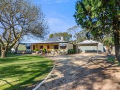  8449 Main South Road Delamere SA 5204 $795,000-$835,000 Sited on a magnificent 9.69 hectares, or in the old language, just shy of 24 acres and positioned approximately 80 kilometres south of the Adelaide CBD in the heart of the extremely popular Fleurieu Peninsular, this stunning property affords the owners, a way of life to be envied, by all and sundry. The main homestead is immaculately preserved and renovated to the minute, whilst a fully independent, standalone, thoroughly self contained separate cottage, complete with adjoining spa hut, delivers a fabulous, continually booked, year round Bed and Breakfast' income. Enormous shedding with separate access, a dam with bore and water license, chardonnay vines, stockyard, massive barn and a tennis court, are just a few of the stunning list of attributes to tick off your small acreage' lifestyle wish list. With the Delamere convenience store combining as the Post Office and gas station metres from your driveway, this breathtaking property is everything that you could want for, in a lifestyle acreage property whilst the proximity to Cape Jervis and the Sea Link ferries to Kangaroo Island, ensure that Bed and Breakfast guests are a certainty to return time after time. A driveway leads past the tennis court to the main residence and plenty of off street parking for all the toys whilst alongside the homestead, the 9m X 6m double iron shed offers secure parking and doubles as hubbies perfect idea of a Man Cave /workshop with concreted flooring and wonderful lighting. Entering the home and the charm of the return verandahs of yesteryear is complimented by the beauty of the faade of the day, magnificently preserved in its character and wonderfully blended with the modern additions of today. The wonderfully high ceilings accentuate the spaciousness, whilst the front lounge to your right of entry features a gas imitation log fireplace and doubles as the very spacious third bedroom. The second bedroom is complete with full length built in robe and study nook whilst the master bedroom is blessed with full length mirrored timber robes, a beautiful ensuite and a parent retreat with access to the raised timber undercover decking at the side of the home. Two sleepouts could easily double as studies, storage or extra bedrooms and both feature the sheer elegance and beauty of polished pine flooring. Continuing the interior tour and the breathtaking feature kitchen is a work of culinary art, credited to the current owners tenure, as are all the exquisite renovations on show. An exceptional feel for the retention of the charm and character of yesteryear, beautifully blends with todays modern standards. The kitchen itself features the class of a granite bench top whilst the 990cm dual fuel oven positioned in the original fireplace is just plain unforgettable. With eye catching timber cabinetry surrounding the mantel, and in completely stark contrast, the opposing side of the kitchen features todays modern kitchen fashion accentuated by the stunning display cabinetry, conspicuously striking splashback, granite top benches and a stainless steel dishwasher. But the coup de gras to this remarkable vision of chef heaven, has to be a walk in pantry so large and so deep that it should almost be renamed the drive in pantry. The adjoining informal family living room boasts a gorgeous pot belly combustion fireplace beautifully backed up by the reverse cycle split system. The formal dining room alongside is yet another treat to savour, complimented by the astonishingly unique, built in wine rack and can be sequestered, courtesy of the elegant, stain glass bi fold doors. Yet another artery leads to the outstandingly modernised wet areas of the home where one can only gasp in admiration at the forethought of design. The B & B cottage continues the theme of class personified, hence it's high demand. Delivering an ambietic warmth to sooth the soul and an adjoining spa rotunda, a unique, love inspiring feature in itself, the self sufficient nature of the cottage, ensures a level of unrivalled privacy and seclusion for the romantically inclined. Repeat business is a foregone conclusion. Or perhaps, if B & B is not for you, it's ideal for extended family accommodation for elderly parents who need your caring wings whilst still craving their independence. Or teenage retreat heaven! Massive shedding, with 4 separate bays, enjoys independent access to the property, delivering the ideal home for your business whilst alongside, the colossal barn has 3 phase power and is bordered by the stockyard. Agricultural cultivation is almost a guaranteed success, with an abundance of water, courtesy of the natural dam and bore, whilst the license extends a water allocation of 8,650KL. With endless added features such as the NBN connected, reverse cycle air conditioning, a 3.6KW solar power system along with much, much, more .call Adrian now for a private viewing today!! FEATURES: • 	 Air Conditioning • 	 Built-In Wardrobes • 	 Formal Lounge • 	 Garden • 	 Huge Shedding • 	 Polished Timber Floor • 	 Secure Parking.. 