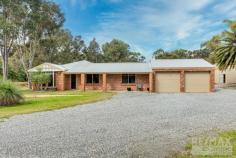  34 Greenvale Place Mariginiup WA 6078 $1,000,000 If you have been searching for an acreage property that is close to all local amenities & not too far from civilisation, be sure to check out this amazing property. Located just 35 km’s from Perth, 13 minutes from Joondalup Station & 9 minutes from Wanneroo Central, this outstanding special rural lifestyle property is a rare find. Highlight features & benefits Include: * 4 Bedroom, 2 Bathroom home * Formal lounge/meals area * Master bedroom with ceiling fan, walk in robe & ensuite * Study / home office * Family / meals areas with high raked ceilings with Jarrahdale log burner * Chef’s kitchen with stainless steel appliances including dishwasher, 900 mm range cooker & rangehood * 3 further bedrooms * Family bathroom * Laundry * Reverse cycle air conditioning * CCTV system * Alarm system * Solar electricity system with 22 panels (4.2 KW) * Huge cedar lined outdoor entertainment area with full cafe blinds for all year-round comfort * Amazing solar heated below ground pool which if fully fenced & gated * BBQ area overlooking pool * Double remote-control garage * 18m x 9m powered workshop with 3 phase power, mezzanine level & 4.2 tonne hoist * Scheme water to house – This is a rarity with acreage! * Excellent water bore with 5 hp Grundfos pump * Great water licence (4,650 KL subject to transfer) * 14,000 litre water tank * Automatic reticulation from bore * Electronic entrance gate * Direct access to Lake Adams bridle path * 3.02 acres (12,220 sqm) For further information & to arrange your private viewing call Team Demo today! 