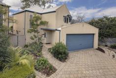  Unit 4/161 Beulah Rd Norwood SA 5067 $775,000 - $815,000 Situated in a secure, gated community of 4 homes, this wonderful light-filled residence is perfect for someone looking for a low-maintenance lifestyle. A spacious light-filled living area downstairs is split into 3 zones, and a wonderful conservatory-like sky window runs along the eastern wall allowing light to flow from above. The family room features a vaulted ceiling and double French doors lead to the private courtyard garden. Upstairs comprises of 3 bedrooms, the main with ensuite bathroom including spa bath. A 2-way family bathroom and large linen cupboard complete the upstairs area. Double side-by-side garage with auto roller door is generous in Norwood and electronic gates operate to allow access into the group. Features include: – Open plan living with sitting room, dining and family with a central kitchen – Bi-fold café doors from the dining room to the side courtyard – Smeg appliances to the kitchen including 5 x burner gas cooktop and oven. Pantry plus dishwasher and central island bench – Lush new carpet throughout including the family room with its high ceiling and double glass doors to the paved courtyard, verandah and undercover curved pergola – Laundry with ample storage plus separate toilet – Upstairs has 3 large bedrooms, all with built-in robes, the main with ensuite bathroom – Ducted reverse cycle air conditioning – Double side-by-side garage – Electric gated entry – Intercom.. 