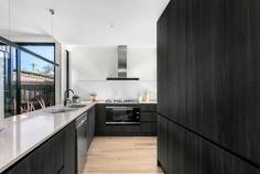  1/29D Newcastle Street Yarraville VIC 3013 $1,050,000 to $1,150,000 A newly built, sleek three bedroom home situated a stone’s throw from Yarraville Village. This architecturally designed home boasts a practical floor plan, high end inclusions and a large open plan living space, delivering the ultimate lifestyle. Beautiful timber floors greet you upon entry and seamlessly guide you past the downstairs double bedroom equipped with bathroom and continues down a central corridor to the light-filled, open plan living area. The grand, contemporary kitchen has endless cabinetry and subway tiles crown the stainless steel, 900mm appliances that are wrapped in Caesar stone. The gourmet kitchen makes entertaining easy with endless bench space for preparing and an island ideal for serving. Double stacker, glass doors seamlessly continuing the entertaining space out to the private back yard. This functional home showcases another 2 large bedrooms on the upper level with the Master enjoying a walk in robe,spacious ensuite and north-facing balcony. The third bedroom is serviced by a central bathroom showcasing floor-to-ceiling tiles, frameless shower screen, black tapware and stone tops. A dedicated upstairs retreat can easily be used as a second living area and also facilitate a functional work space. This central address allows you to walk to school and parks and is only 500m to all the Villages extensive dining, cafes, bars, Sun Theatre and great shopping. Yarraville train station, Francis St buses, bike paths and 9km to Melbourne’s CBD puts you in a perfect location. Set yourself up for the future in this flexible, low-maintenance home. Additional features include- -floating staircase -separate laundry -double kitchen sink -canopy rangehood -SS dishwasher -matt black tapware and hardware throughout -concealed cistern toilets -ample storage options -plush carpet on the upper level -off street parking -low maintenance gardens -split system heating and cooling throughout.. 