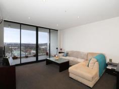  191/1 Mouat Street Lyneham ACT 2602  $345,000 Positioned in the heights of the 10th floor is this stunning one bedroom apartment with the most majestic views past Lyneham and Turner, you will be simply blown away by the views. This has to be one of the best one bedroom apartments I have come across.   This amazing executive apartment is built over 76.6m2 (approx.) and offers spacious living area, modern designer kitchen with stone benchtops and large bedroom. The complex offers 25m indoor swimming pool, gym and barbeque area. Superb location. Currently tenanted at $410.00 per week, month by month. Features Include: - Top floor apartment (10th level) - TFA including balcony 76m2 (approx.) - Breathtaking views across Lyneham & Turner - One bedroom apartment - Large living area - Designer kitchen with stone benchtops - Car space and storage cage - Reverse cycle air conditioning - Indoor 25m swimming pool - Enclosed gym - Barbecue area - AXIS apartments EER: 6 Living: 59 m2 (approx.) Balcony: 17 m2 (approx.) Body Corp: $ 3,041.28 pa (approx.) Rates: $ 1,194.91pa (approx.) Land Tax: $ 1,310.84pa (approx.) 