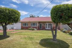  9 Sinclair Street Rivervale WA 6103 $499,000 Nestled in a quiet, cul-de-sac street that is very close to bus stops and so much more, this charming and original 3 bedroom 1 bathroom brick-and-tile home is as solid as they come and sits comfortably on a 594sqm (approx.) block with a lush and generous frontage. A huge carpeted front lounge pleasantly welcomes you inside and leads through into a combined kitchen and dining area with an electric-upright cooker, tiled splashbacks, built-in storage and external access. At the rear of the property lies a separate games room that doubles living options and is splendidly overlooked by a delightful back patio encouraging covered outdoor entertaining. The two minor bedrooms are cosy and the master bedroom is the biggest of the three. There is plenty of scope to add your own modern personal touches throughout – or to one day build your family’s dream residence here if a “renovation rescue” is not your thing. You will absolutely love living only walking distance away from bus stops, Rivervale Primary School, Belmont Oasis Leisure Centre and the stunning lakeside Faulkner Park, with Belmont Forum Shopping Centre, Cloverdale Primary School, Belmont City College, sporting facilities, Ascot Racecourse, our picturesque Swan River, Perth Airport, the Victoria Park coffee strip, the Crown Towers and casino entertainment complexes, Optus Stadium, our vibrant Perth CBD, train stations, major arteries and even the freeway all just a matter of minutes from your front doorstep in their own right. How lovely! FEATURES INCLUDE; – 3 carpeted bedrooms, 1 bathroom with a separate shower and bathtub – Welcoming front lounge room with split-system air-conditioning and a wall heater – Separate carpeted rear games room with space for a pool/billiards table – Direct patio access from the kitchen/dining area – Separate toilet off the laundry – Double laundry wash troughs – Single lock-up garage – Security doors and screens – Solar hot-water system – Bore reticulated garden and lawns – Sprawling green front-yard and backyard lawns – Rear garden shed – 594sqm (approx.) block – Zoning: R20/40 Features • 	 Air Conditioning • 	 Close To Shops • 	 Close To Transport • 	 Garden • 	 Secure Parking • 	 Formal Lounge • 	 Kitchen/Meals.. 