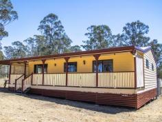  595 WILLIAMS ROAD BENARKIN QLD 4314 $249,000 This 2 bedroom home with a new kitchen, has built-ins & ceiling fans , with the main bedroom opening onto the front verandah. The new carpet & vinyl matches up with the freshly painted areas, as well as an air con for summer , and a wood heater for winter. The roomy bathroom has a seperate bath & shower. The property has 2 road frontage, solar power going into the grid, fenced, a carport, double lockup garage, set on steel stumps, tank water, and set on approx. 5.5 acres. Don't miss out, come & have a look. 