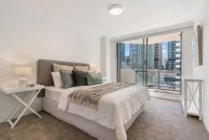  44/533 Kent St Sydney NSW 2000 $940,000-$960,000 Located on the tenth floor within this well-maintained security building, apartment 44 is the definition of city chic. Having only recently undergone a complete makeover there is nothing for the new owners to do - other than move in and enjoy living in the most vibrant part of Sydney's CBD. A stunning new kitchen with European appliances and stone bench tops greets you as you enter this amazing sky home. Two oversized bedrooms both with built in robes, a bespoke bathroom with separate w/c, luxurious new carpet, enormous balcony and external swimming pool make this home the perfect city abode. • Spectacular views from a large balcony • Brand new kitchen with Euro appliances • Stone bench tops • Internal laundry • Luxury bathroom, separate w/c. • Two oversized bedrooms with built ins • New carpet • Security parking • External swimming pool • Metres to Town Hall, Chinatown, Darling Harbour • Close to schools, transport, shopping precincts. • Property Size: 88sqm + carspace 14sqm.. 
