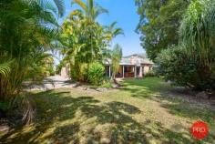  24 Loaders Ln Coffs Harbour NSW 2450 $899,000 - $949,000 Set on just over 2500m2 this private and spacious home is sure to impress. Only minutes from the CBD of Coffs Harbour, this is a rare find in the current market and will certainly appeal to a large range of buyers. The home itself is very spacious and includes multiple living zones and large bedrooms. The main bathroom has recently been renovated and is finished with floor to ceiling tiles and quality fixtures and fittings. The kitchen is original but in very good condition and comes with solid granite benchtops and modern appliances. The functional floor plan has been designed with the family in mind and one end of the house is great for kids or guests and can be closed off from the rest of the house and made fully self contained. The master bedroom with ensuite is privately tucked away at the opposite end of the house and looks over the private rear lawn and gardens. For the entertainer this home is perfect with a huge living area that can be opened up on both sides with a sparkling inground pool on one side and the beautiful greenery of the park like gardens on the other side. For those craving space and privacy this home has got the lot with a mostly level rear yard leading down to the picturesque creek as your rear boundary. Extra vehicles are also well catered for with a 4 bay lock up shed, carport for a large caravan or boat, plus another double carport in front of the house and there is also side access to the rear yard. This is a once in a lifetime opportunity to secure a large house on a large parcel of land in such a convenient location. Don't hesitate as this one will not last long! 