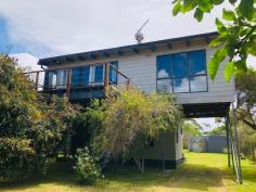  107 Acacia Rd Walkerville VIC 3956 $339,000 UNDER CONTRACT PENDING FINANCE APPROVAL. This much loved beach house has been cherished by the current owners for over 37 years and is now ready for a new family to enjoy. Set on a flat fenced block of approx. 598m2 with a carport, LU garage / storage shed and flat parking for boats / caravans or extra cars. Light filled open plan living room upstairs with raked ceiling, wood heater and doors to deck. Kitchen with electric appliances and breakfast bar to meals area. Two spacious bedrooms upstairs plus central bathroom. Downstairs family room / bunk room with polished timber floor and second bathroom / laundry. Being sold partly furnished. Right opposite the coastal reserve with the pristine coastline walking distance away, or 4 mins drive to boat launching on the beach. 