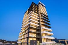  1006/3 Rawson St Wollongong NSW 2500 $579,000 - $619,000 A rare one-bedroom offering with its sunbathed corner aspect and wraparound balcony, this modern apartment boasts comfort and convenience in equal measure. Facing north in a brand-new lifestyle complex, it provides a carefree CBD base complete with open-plan design, alfresco flow from every room and stunning outlooks stretching from the Illawarra escarpment range to the sandy coastline. A heated pool onsite, a storage cage on title and a secure parking space complete a high-quality prospect, in a dynamic city-centre locale steps from Crown Street shopping, supermarkets, cafes and transport. Features: Impressive tenth-floor setting in a pet friendly development Glamorous lounge/dining zone flooded with natural light Gas kitchen boasts stone benchtops, an island and dishwasher Fully tiled bathroom, in/outdoor bed with wall-to-wall robe Storage cupboard in foyer, Euro-style laundry, intercom Short walk to parks, restaurants and Wollongong station *some images may contain digital furniture.. 