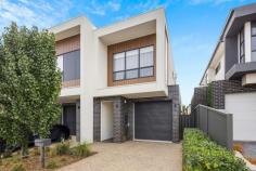 6 Brook Avenue Plympton SA 5038 $595,000 to $655,000 This street frontage 2018 built Torrens titled architecturally designed Townhome offers quality construction together with high end specifications & finishes to create the best of modern low maintenance living. Light natural colour tones feature in the designer kitchen with stone bench, onto a large open plan living & dining space filled with northern light through big glass sliding doors opening onto a covered alfresco. Also on the ground floor is an optional master bedroom with wall to wall robe with drawers and shelving and a spacious luxurious ensuite. Laundry with overhead cupboards and space for washing machine and separate dryer and a separate wc. A generous lock up garage has secure direct internal access. Upstairs there is another master bedroom option with huge wall to wall robe with easy access to the main bathroom with a full size bath plus a third spacious bedroom with built in robes, plus there is a study nook with built in bench. Some of the other features and specifications include; • High 2.7m ceilings and tall 2.4m doors • LED Lighting throughout, heat lamps to bathrooms, data points to study and under stair, extra double power points throughout with TV aerial to both sides of living space and a TV point to master bedroom • Sensor lighting to front for security • High quality kitchen with several soft close drawers and doors, pot drawers and powered appliance space, microwave space and plumbed fridge space, spot lighting under overhead cupboards • Bosch Stainless steel Appliances with large 700mm gas cook top and Bosch dishwasher • Large easy access pantry • 40mm stone bench tops with waterfall ends • Good size vanities for more storage with stone bench tops • Large alfresco with mains gas connection point for BBQ or Heater • Large floor to ceiling robes to bedrooms with all having soft close drawers and shelving • Double linen cupboard & under stair storage space • Garage with sealed non slip 2pack floor • Ducted reverse cycle A/C • Security system • Colour video Intercom • Auto timer controlled irrigation to established green gardens Situated in a quiet location with a park at the end of the street & 10 minutes drive to the City or the beach. If you’re unfamiliar with the localities, restless legs will find it an easy stroll from quiet Brook Avenue to the newly developed Weigall Oval Reserve & walking trails, Rex Jones Reserve or – for any four-legged friends – the West Torrens Dog Park. 