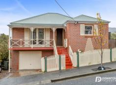  8 Glebe Street Glebe TAS 7000 $695,000 Immaculately presented throughout and set on the City of Hobart’s doorstep, is this premium brick home offering the ultimate convenience whilst still being so private. This wonderful stand-alone townhouse would make the ideal property for professional couples, downsizers or investors, the city fringe location ensures an active lifestyle close to all amenities. Upon entering, you are immediately impressed by the enclosed porch offering a serene place to sit and admire the city skyline. Features continue inside with neutral colours, some timeless finishes and a lovely sense of space and light. Accommodation provides a generous open living space with the large lounge room flowing onto the dining area and kitchen. The quality timber kitchen offers loads of cupboard and bench space and ample room for a fridge. There are two good size bedrooms both with built in robes, separate toilet, laundry and the home is serviced by a very neatly presented family bathroom. Outside, the landscaped gardens are well maintained and provide privacy. There is an external door providing access to the single garage and additional storage. City living does not get any better than this. This home is a short walk to the CBD, hospital and to many restaurants and café. If you are looking for a property with character, one which is charming, well-maintained and a much-loved home than 8 Glebe Street is sure to impress upon inspection. – Charming 1987 brick home on city’s doorstep – Tightly held and sought-after location – Double glazed windows – Generous open living space with quality heat pump – Two spacious bedrooms – Established landscaped gardens – Single garage – Additional under house storage – Short walk to the CBD, Aquatic Centre and Royal Hobart Hospital.. 