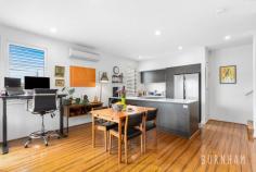  485 Barkly Street Footscray VIC 3011 $730,000 - $800,000 A residence offering mixed-use flexibility captures exactly the appeal of today’s Footscray – a city edge context where living, working, and enjoying are all simultaneously achievable in a single address. This two-bedroom townhouse fuses space, functionality and contemporary living, posing as the perfect opportunity for homebuyers, service providers, entrepreneurs or investors. Spanning over three levels, any entertainer would revel in the chance to occupy this home. The open plan lounge and dining area is enveloped in light and opens to the grand balcony, making indoor/outdoor living effortless. The kitchen features a stone, island bench with breakfast bar, double sink, substantial storage, 900 gas cooktop and plantation shutters. A large powder room with extended bench space, wall to wall mirror, and ample storage completes this level. Unwind in the master suite on the upper level of the home. This space is extremely generous and features, lots of light, plantation shutters, luxe carpet and a walk-in robe with ample storage. The second bedroom follows similar trends. The bedrooms are serviced by a large central bathroom with tub, shower with rainfall shower head, ample storage, lots of light and calming neutral tones. The opportunities are boundless on the lower level of the home, featuring a second living space, that could easily transform into a studio, salon or large office. Located less than 10kms from the city, enjoy easy access to an abundance of amenities. IGA and a variety of Barkly Street shops, cafes and restaurants, EJ Whitten Oval, West Footscray train station, parklands and bus stops are just around the corner. Footscray’s city centre, highway access, Victoria University, multiple schools, the Western Hospital and Highpoint Shopping Centre are only a short commute away. Additional features: – Split system air conditioning and heating in the dining, living and master bedroom – Skylight above the stairs – Two linen cupboards on the upper level, one on the second level – Rear access – Secure, remote-controlled single garage – European laundry – Plantation shutters throughout – Wall panel heater in the second bedroom. 