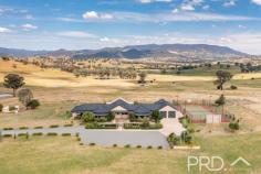  3/370 Morgans Reserve Road Tumut NSW 2720 A very rare and unique opportunity to secure across 23 acres of lifestyle allotment, only a short drive to the CBD of the picturesque town of Tumut. The convenient location comprises resort-style living in your own rural paradise, with modern, open-plan design and views of the surrounding mountains one can only dream of. The home offers an abundance of space with over 370m² of internal living area. The thoughtful floor plan consists of four large bedrooms with built-in robes, generous living areas and games room, formal lounge plus a study and generous outdoor living options to suit all seasons. The light-filled master bedroom opens out to arguably the best views in the valley and comprises a large walk-in his/hers style wardrobe with ample storage features. The king-size ensuite has a twin shower, his/hers basin and a luxurious built-in spa bath. The centralised kitchen includes a large five burner gas stove, abundant storage, large island bench with power, dishwasher and dual sink with inbuilt water filtration system, overlooking the extra-large living area with tranquil views across the valley, through floor to ceiling windows. Premiere Features: - Four great sized bedrooms, all with built in robes and ducted reverse-cycle heating and cooling - Master bedroom is positioned privately to one end of the plan, with direct rear deck access and includes king-sized ensuite, large walk-in robe and study nook - A king-sized ensuite with twin shower and his/hers vanity, built-in spa and toilet - Main bathroom with large built-in spa bath, large shower and vanity, with separate toilet - Central kitchen with stainless appliances throughout, gas heating, ample storage and bench space options and large island bench with power - Large open plan living area with wood box fire heater, direct access to the rear deck and frameless feature window overlooking the rear deck and sprawling views of the picturesque surroundings - Light-filled extra-large rumpus/billiard room - Large formal lounge perfect for a home theatre - Sizeable study or option for fifth bedroom - Internal laundry with built-in floor to ceiling linen press and access to the rear yard - Rear fully covered wrap-around timber deck overlooking the surrounding countryside - Heated in-ground swimming pool with water feature - Additional powder room off the rear deck - Pump shed to the pool, built-in under the roof line and accessed via the rear deck - Full-sized tennis court with additional basketball ring complimented by stadium style lighting - Enormous four car garage with internal access (8m x 12m) - Large formal entry - Additional large barn style industrial shed with three standard rollers doors, additional heavy vehicle access, includes shower and toilet, ample mezzanine storage and car hoist - Large chook shed and roost - Low maintenance and expansive house grounds both front and rear - 3 x 23,000 litre rainwater tanks - 1 x 125,000 litre rainwater tank - Approximate 23-acre allotment with two dams - Approximate 370m² of internal living with ducted zoned heating and refrigerated cooling Why Tumut ? Considered as the gateway to the Snowy Mountains, Tumut is a picturesque township resting by the river and located approximately 70 minutes to Wagga Wagga. Popular amongst snow ski enthusiasts during the winter months and boasting a plethora of outdoor activities during the warmer months, including water skiing, camping, fishing in the dams, rivers and estuaries, mountain bike riding and walking tracks. The township itself boasts a thriving central business district and copious local and sporting events throughout the calendar year, from local races at the Tumut Turf Club to locally focused festivals and celebrations. Tumut really does offer a great lifestyle and caters for all ages. 
