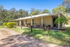  17 Park Avenue Woolgoolga NSW 2456 If you're looking for the opportunity to have a rural lifestyle combined with close proximity to arguably one of the best costal locations in New South Wales, then 17 Park Avenue should be on your inspection list. Entering the property 'Tall Timbers', you are greeted with a timbered driveway and spring fed dam. Following up the driveway of this 2.4 hectare property you are led directly to the selectively landscaped four bedroom, two bathroom low set home. The wonderful North Easterly orientated outlook over your property will best be enjoyed of a morning, sitting on the wrap around patio with your tea or coffee. The master bedroom boasts walk in robe and ensuite. Separated from the other three bedrooms by the open plan lounge and formal dining, which is well appointed including combustion heater and separate sunroom. The country style kitchen is based in the heart of the home with scenic vistas from the the front and rear windows. Car accommodation comes in the way of a separate ColorBond, double lock up garage. Additionally, there is another garage with carport which extends to a large workshop. The cleared paddocks provide the best spot for your beloved animals and fruit trees have been planted with the future in mind, this will provide the home grown nourishment that is hard to find on residential allotments. With a short drive to Woolgoolga township, Main Beach, Woolworths, schools and sporting fields, this property will be sure to attract a lot of interest.  