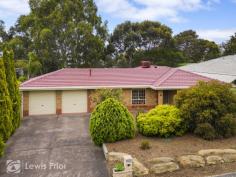  5 Outlook Drive Aberfoyle Park SA 5159 $720,000 - $750,000 First National Lewis Prior takes pride in presenting this property to the market. Hidden back from the street you will be presently surprised when walking into this home. To the right you have the spacious main bedroom with ensuite and walk in robe. The main bedroom has floating floors, ceiling fan and a large window with auto roller shutter. To the left you move through the sunken lounge which has plenty of space for all the family, with new carpets, large windows each with auto roller shutters, feature mantel place with gas space heater. Stepping up from the lounge you arrive at the formal dining space conveniently located off of the updated galley kitchen. The kitchen is fitted with gas cooktop, electric oven, dishwasher, and filter tap. There is plenty of bench space, including breakfast bar and walk in pantry. The second living area is a great space off of the kitchen with room for a second sitting area or less formal meals area. Straight off of the second living area you open up to the huge outdoor entertaining area, complete with outdoor sink and meals preparation space. The home also has three additional bedrooms, all with built in robes. Bedrooms 2 and 3 also have ceiling fans. Centrally located there is the popular 3-way family friendly bathroom. The laundry is located at the rear of the home with direct access outside. The large built-in storage will certainly be appreciated. The property has a huge amount of undercover space. There is a double carport with two electric roller doors and the ability to drive through to the large garage / workshop. Located within walking distance to the Aberfoyle Hub Shopping Centre and interchange. This family home will certainly tick a lot of boxes for a lot of people. 