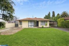  34 Kildonan Avenue Para Vista SA 5093 $499,000 - $525,000 Built in 1971, this modernised brick veneer home has all the comforts. Appealing to those starting out or moving up, the home has an extensive verandah, carport and garaging on a traditional size allotment of 625m2. A stone tiled hallway leads to an L shaped main lounge and dining room which features a cosy combustion heater, carpeting and quality down lighting. Adjacent is the kitchen meals area which features a skylight and window to draw in plenty of natural light. The home has 3 bedrooms, all are carpeted with ceiling fans. Built-in robes feature in bedrooms 1 & 2 with bedroom 2 having a skylight. Bedroom 2 & 3 feature security rollers shutters. The main bathroom has both a shower and bath, with a separate toilet for added convenience. The walk through laundry with external access completes a tidy interior. Your car parking is sorted with a dual driveway. A further double carport on the bedroom side of the home offers additional space for a trailer, boat or caravan parking. Another driveway also offers drive through access to a 7m x 4.m garage and workshop. The extensive back verandah is perfect for entertaining friends and family with a further shade cloth covered pergola ideal for the hotter months. The yard is fully landscaped with a generous lawned area. Features: - 3 bedrooms, bedrooms 1 & 2 with built-in robes - All bedrooms with ceiling fans - Stone tiled entrance hall - L shaped living / dining with downlights, quality venetian blinds and combustion heater - Kitchen / meals with stainless steel gas cooking - Updated bathroom with separate bath and shower - Separate toilet - Undercover entertainment / carport area - 7m x 4m garage / workshop - Second driveway and 2 car carport - Rain water tank - Tool shed - Fully landscaped allotment - Instant gas hot water service - Ducted evaporative air conditioning throughout This home is located close to a number of schools and sporting clubs, along with parks and natural reserves. Public transport is just a stone throw away, as are the local shops. 