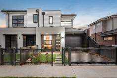  1/1 Clarendon Parade West Footscray VIC 3012 Sitting proudly on a beautiful tree-lined street, this brand new, luxury property is an unmissable opportunity. No expense has been spared in curating this high-end home featuring the creme de la creme of all fixtures and fittings. Natural light floods each space with large, high-quality, double-glazed windows throughout, and squareset, high ceilings make already generous spaces, feel even more grand. High-end European Oak hardwood floorboards (with a satin finish) guide you throughout the lower level of the home. Light-filled and airy, the generous, open plan living, and dining zone becomes the perfect area to entertain. From this space, large, double glazed, bi-fold doors open to the rear courtyard with merbau decking, making indoor/outdoor living effortless. The heart of the home, the kitchen, fuses luxury, style and functionality; featuring high-end stone benchtops, matte black finishes, under bench and cabinetry mood lighting, stone splashback, wide waterfall island bench, gas cooktop and an abundance of storage. Work from home with ease in the light-filled office space, overlooking the landscaped front courtyard and quiet, picturesque streetscape. Supreme Tasmanian oak hardwood stairs guide you to the upper level of the home where high quality loop carpet enhances each space. The grand master suite boasts generous proportions and is serviced by a large walk-in robe and a private, luxury ensuite. It is rare to find secondary bedrooms so large and light-filled with floor to ceiling, mirrored built-in robes. The two central bathrooms and master ensuite, feature floor to ceiling porcelain tiles, stone benches, stylish black finishes, custom frameless shower screens, vanity with storage, shower niches and a free-standing tub on the lower level. A large, separate laundry adorned in stone with an abundance of storage completes the home. Embrace the outdoors with large front and rear courtyards with low-maintenace, landscaped gardens and high-quality plants. Bordering Yarraville, located less than 10kms from the city, enjoy an abundance of amenities at your doorstep, including numerous schools, train stations, parklands, Yarraville Village, shops, cafes and restaurants. Additional features: – Lock-up remote-control garage – 2PAC custom made cabinetry in the kitchen, bathrooms and laundry – Built-in shelving and drawers in all wardrobes – High doorways throughout – Ducted heated and refrigerated cooling throughout – Security alarm and video intercom – Quality Dulux paint throughout – Exposed aggregate driveway 