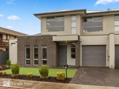  2A Coventry Street Oaklands Park SA 5046 $620,000 - $670,000 This modern townhouse is ready for you to simply move in and enjoy. Popular layout has the main bedroom with ensuite bathroom on the ground floor while upstairs bedrooms 2 and 3 are generous in size and have built in robes. The open plan living area has timber style flooring while the kitchen has ample cupboards, a large island bench to prepare your gourmet delights plus stainless steel appliances including dishwasher. There is ducted reverse cycle air conditioning and a security system. The grounds are super low maintenance and the undercover patio is ideal for casual entertaining. There is also a drive through lock up garage with auto door. Ultimate convenience is offered with all of your daily needs within minutes including, bus, train, schools, Aquatic Centre and Westfield shopping. Torrens Title means no body corporate fees and pets are ok. We welcome your enquiry and encourage you to make a personal appointment to inspect this property at a time that suits you. 