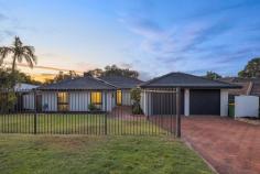  49 Dickenson Way Booragoon WA 6154 Located on a quiet street and featuring a generous 717 square metres of Green Title land with a wide 20 metre frontage, this sprawling family home has been recently renovated and is ready for the next family to move in and enjoy! This quality double brick home has a sensible floor plan with generous proportions. Specifically designed for a growing family, this home offers multiple living areas to provide zones for all ages and spacious entertaining areas both inside and out to enjoy with family and friends. The tastefully renovated kitchen is positioned at the heart of the home and opens out to the open plan family, dining, lounge area and flows onto the undercover alfresco entertaining area. The master bedroom is spacious with an ensuite bathroom and large walk-in robe. Both bathrooms have been recently renovated. The outdoor entertaining area is where you’ll want to spend most of your time – undercover north facing entertaining area with sparkling below ground heated swimming pool and space for kids and pets to play yet surrounded by easy care tropical gardens for low maintenance living. The front yard is fenced and provides a lovely additional grassed area for families to enjoy! Additional features of this home include air-conditioning, double glazed windows and doors throughout, solar panels, new flooring and external rendering to add to the home’s street appeal! The double garage is oversized and includes a store area in addition to a large separate workshop area. This conveniently located home is within 15 minutes easy walking distance to LeisureFit Recreation Centre, park and playing fields, Westfield Booragoon and bus stop to Perth CBD and Fremantle and is within the catchment of excellent schools including Booragoon Primary School and Applecross High School. 