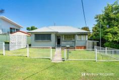  2 Jesson Parade Warners Bay NSW 2282 $750,000 to $799,000 If you have been looking for a family home, that has everything you need for right now ... but with potential to grow in the future!! Well, we think we've found your forever home! Nestled in a quiet street, less than 1km from the thriving Warners Bay restaurant and cafe strip, sits this cheerful, very well maintained two bedroom home, that has never been offered for sale before. Built in the 1960's, when houses were built to last, this home has been loved and tastefully updated through the years. After many years of backyard cricket and family bbq's this home is ready to create new memories for another family. Imagine being able to walk the children to the well respected local primary school, just 150m away, then continue to your favourite cafe for a coffee or breakfast, before strolling along the walkway around picturesque Lake Macquarie and then back home - just 500m from the water. What a lifestyle - quiet street - awesome lakeside suburb with everything you need close by - just perfect for raising a family, or an ideal investment opportunity! This home will provide your family space to grow, room to entertain and a vibrant lakeside lifestyle. There are two good sized bedrooms located close to the modern bathroom on one side of the home. The other side is cleverly designed offering a modern, stylish kitchen central to two living areas, one with air conditioning, formal dining, and access to the screened alfresco at the rear, overlooking the yard. There's plenty of room to drop in a pool or extend the home in the years ahead. The attached drive-through carport will be handy for bringing the water toys home after a fun day on the lake. Drive them straight through to the big fenced back yard 