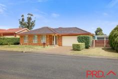  4 Woodward Avenue Tamworth NSW 2340 From the moment you pull up in the driveway you will feel like you are home. The front entrance gives way to a gorgeous lounge room that flows through to the kitchen dining and family room, a large closed in sunroom takes up the length of the side of the house this adaptable space can be used for entertaining, a rumpus room, more bedrooms or a home work space. The kitchen is Light and bright with a breakfast bar, gas cooktop, wall oven, pantry, double sink and dishwasher We have three bedrooms, the master having an ensuite and built in robes. The main bathroom has an inset spa bath, shower and separate toilet for convenience. Now for the boys offering side access to the large double lock up shed located in the backyard plus the garage attached to the house. 