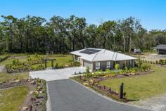  24 Little Tern Court Gulmarrad NSW 2463 Introducing a thoughtfully crafted energy efficient home that embodies the principles of sustainability. Deliberate design choices have yielded an energy-efficient home that harmonises with its surroundings. Adorned with generous north-facing windows in the kitchen and main living area, this residence uses passive heating to naturally warm its interiors during the winter season. A cross breeze has been integrated, facilitating natural cooling during the summer months. Built just over a year ago, this home embraces a 6.6kw solar system, ensuring a reduced environmental footprint while offering ducted air-conditioning and heating throughout the home. Nestled upon an expansive 6942m2 lot with the privacy of a bush backdrop offering an unrivalled sense of privacy. This meticulously landscaped property features a blend of tropical foliage and fruit trees. The professionally designed landscaping leaves ample space for future additions, allowing for endless possibilities to enhance the property according to your preferences and needs. The heart of the home lies in the open plan living area enhanced by high raked ceilings, this space boasts a kitchen adorned with a large stone island bench, granite sinks and a butler's pantry. With an abundance of natural light, the open plan living area provides a strong indoor-outdoor connection. This property showcases high-end finishes of modern aesthetics with a charming coastal country ambiance. Providing ample space for all with four bedrooms and two bathrooms. Two of the bedrooms are equipped with walk-in robes and ceiling fans, ensuring comfort and convenience. The expansive master suite features an ensuite with a large vanity and shower, as well as a walk-in robe. Enjoying private scenic views of the backyard, the master suite creates a serene retreat within the home. In terms of design, finishes, and spaciousness, this home effortlessly encompasses everything. With its immaculate condition, it not only provides the fresh ambiance of a new home but also exceeds expectations by virtue of the meticulous attention to detail and diligent efforts already invested. Rest assured, all the arduous work has been expertly completed, elevating this residence to a level that surpasses the new home experience. In addition, this property boasts an array of remarkable features, including: Designed for passive solar heating, cooling and cross ventilation Ducted air-conditioning/heating throughout the home 9-foot ceilings throughout 7'8" interior doors throughout Media lounge room True butler's pantry with white double granite sink and dishwasher Entertaining area overlooking the garden setting Day and night blinds 18 Solar panels - 6.6 KW solar system Sealed driveway with concrete and turning area 8.3 x 6.2 meter shed with electricity and lights Landscape Architect master planned designed gardens with sandstone boulders. The gardens have been designed as low maintenance with a large amount of mulch Septic system is a reed bed type (no pumps) to suit 6 bedroom (for a future secondary dwelling), does not require ongoing council inspections The suburb of Gulmarrad is a fantastic lifestyle choice, with both a country and coastal feel as you are nestled between the riverside village of Maclean and the coastal havens of Brooms Head and Yamba making this the perfect lifestyle. 