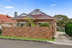  38 Dempster Street West Wollongong NSW 2500 $1,375,000 Standing proudly across 942 sqm, this charming, well-loved four-bedroom home ticks all the right boxes. Distinctively spacious and full of light, this warmly inviting residence seamlessly blends form and function with an adaptable floor plan that can easily cater to a growing family needs. Grounded in practicality, the garden level features a defined kitchen/dining zone, polished timber floors, escarpment views and three generous-sized bedrooms, including an east-facing master suite. While the lower ground floor boasts a self-contained flat complete with a kitchenette, bedroom and laundry/bathroom. There is endless renovation, investment and development potential for the astute purchaser to enjoy (STCA). Features Excellent forever-home potential across two versatile levels All main living on the garden-level with three bedrooms, spacious bathroom + ensuite Private self-contained retreat underneath complete with kitchenette, storage Well maintained kitchen, a/c units in living + master bedroom Energy-efficient solar panels Oversized double garage + carport Super-sized backyard with child friendly lawn, low maintenance garden, rainwater tank 