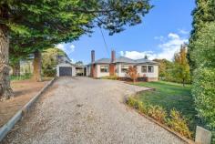  9 Cork Street Gundaroo NSW 2620 $900,000-$940,000 With wonderful cottage appeal this 1950's cottage is situated in the heart of historic Gundaroo Village just a short 30 minute commute from Canberra. Gorgeous period features add to the cottages allure including high set ceilings, ornate cornices, original hardwood timber floorboards, picture rails and a art-deco inspired fireplace. A recent renovation now sees a stylish country kitchen with an island bench opening out to the lounge and dining spaces. A past sunroom extension is the perfect spot for an additional activity room for the kids or as a home office. Head outdoors and there's 2060sqm of space to tinker with a ready made vegetable garden and chock yard, garden shed for the tools and single lock up garage. The back half of the block is open and holds further potential for an orchard or perhaps extra shedding with rear lane access. In fact Gundaroo's excellent primary school is a hop, skip and a jump across the rear lane making school drop off/pick up super easy. Sure to be appealing for families and couples alike, 9 Cork Street Gundaroo is super cute with loads of space to expand. Additional details: 2 living spaces and 3 large bedrooms Reverse cycle split system and two fireplaces for cosy winters Renovated country kitchen Laundry/walk-in pantry Private front deck and gardens Secure yard and rear lane access 2 x 22500 Litre rain water tanks Garden tank and outdoor loo Aerated water treatment septic system RU5 Village zoning Located in the heart of Gundaroo - minutes from the local primary school, restaurants, pub, post office and shop School buses depart from the village to Canberra's secondary schools daily 